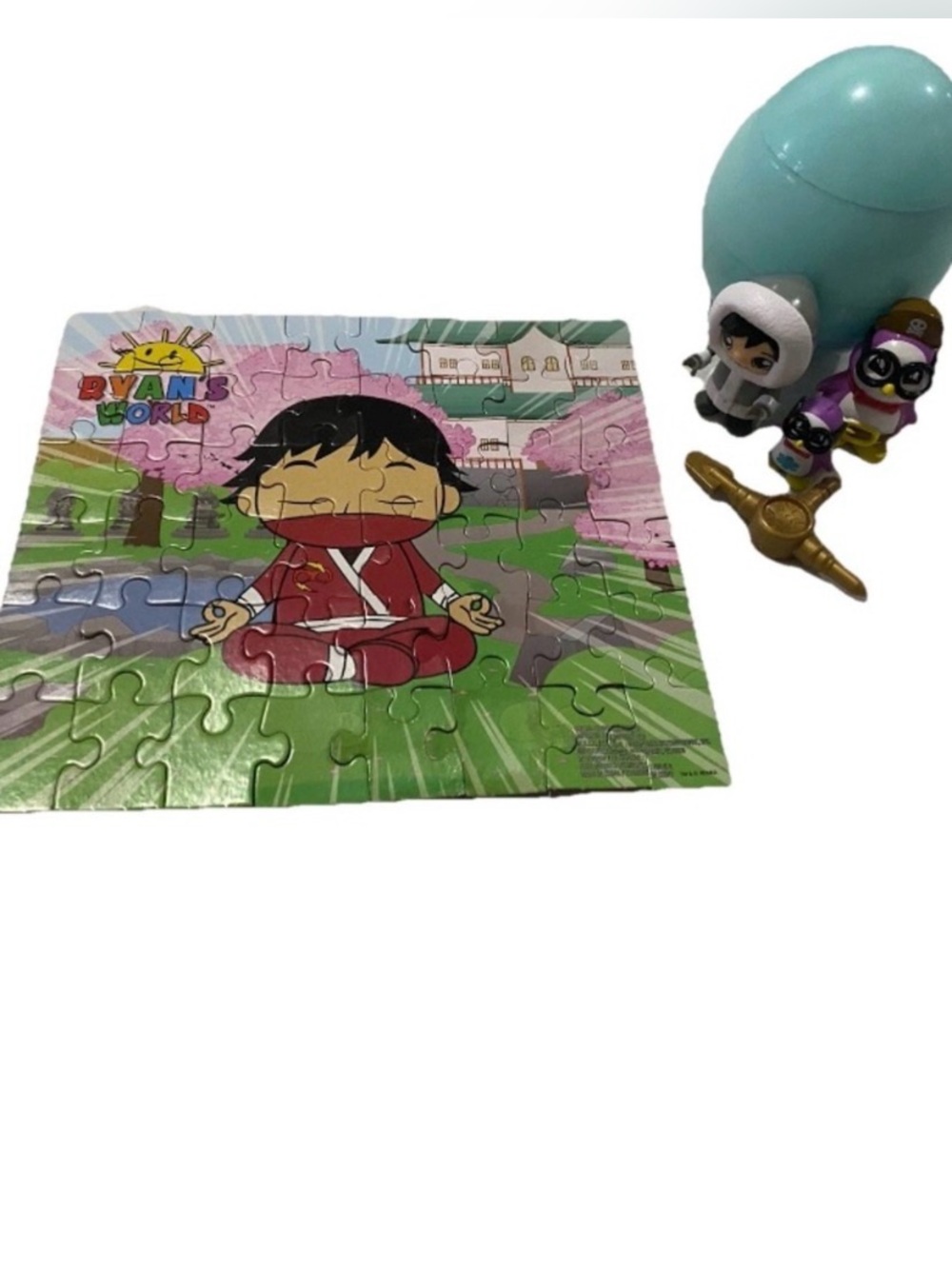 Ryans World Mystery Surprise Egg Penguin Toy Figures & Puzzle